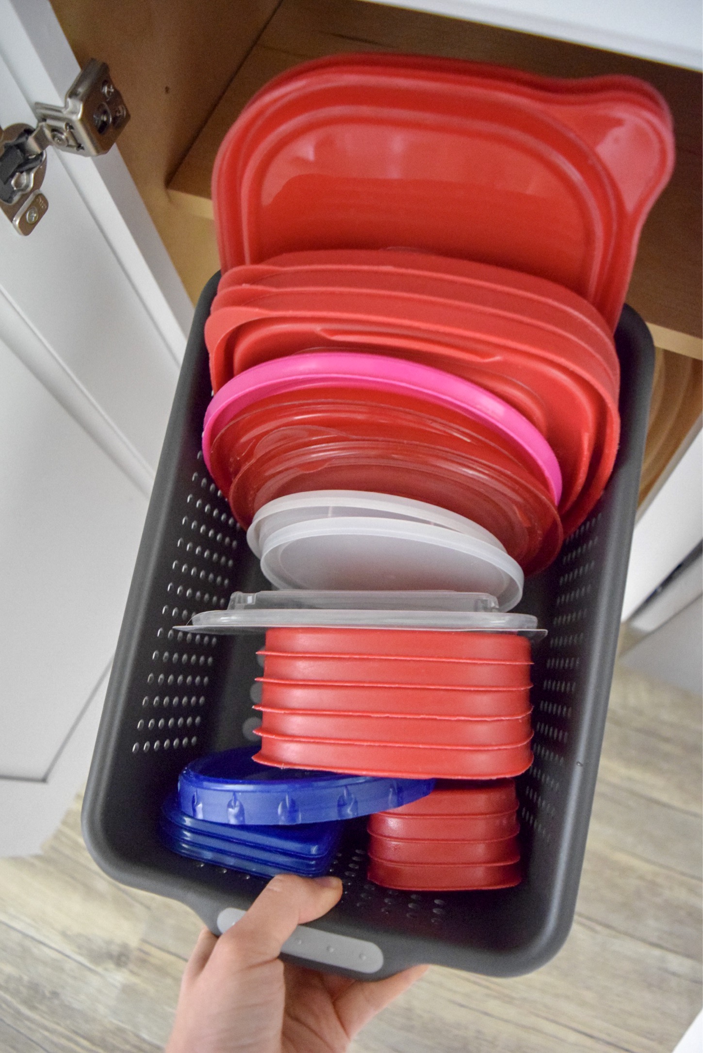 Easy Way to Organize Tupperware in Cabinets